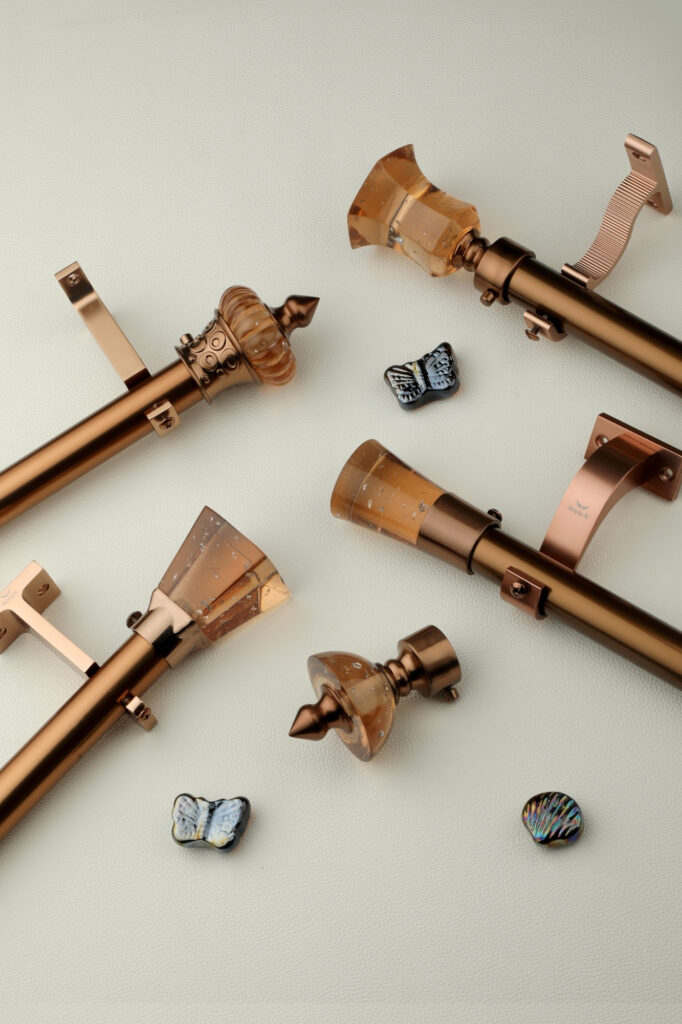 Copper Finish Curtain Rod with Designer Crystal Finials Decorative copper curtain rod system with crystal finials and premium mounting brackets for luxury interiors.